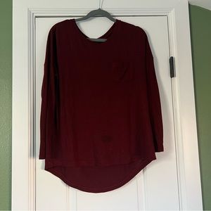 Red dolman long sleeve tunic top with pocket